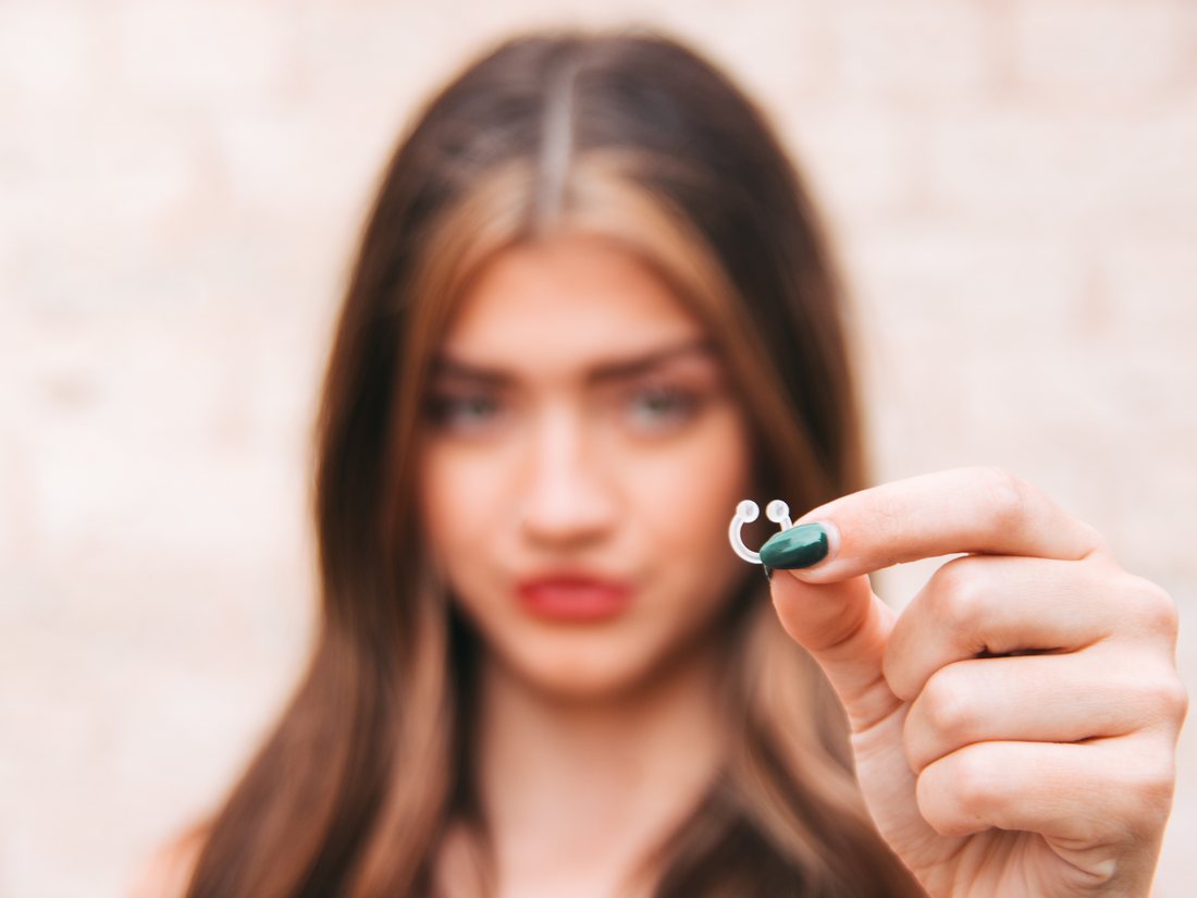 holding the essence ring up close, from our own shoot